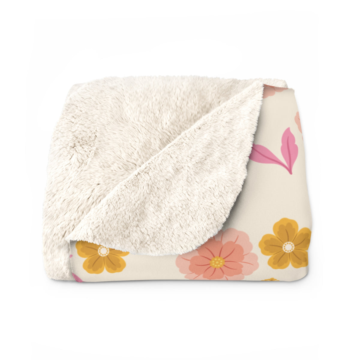 One corner of a folded Cream sherpa fleece blanket turns back, revealing the fluffy cream sherpa back beside the little flowers.