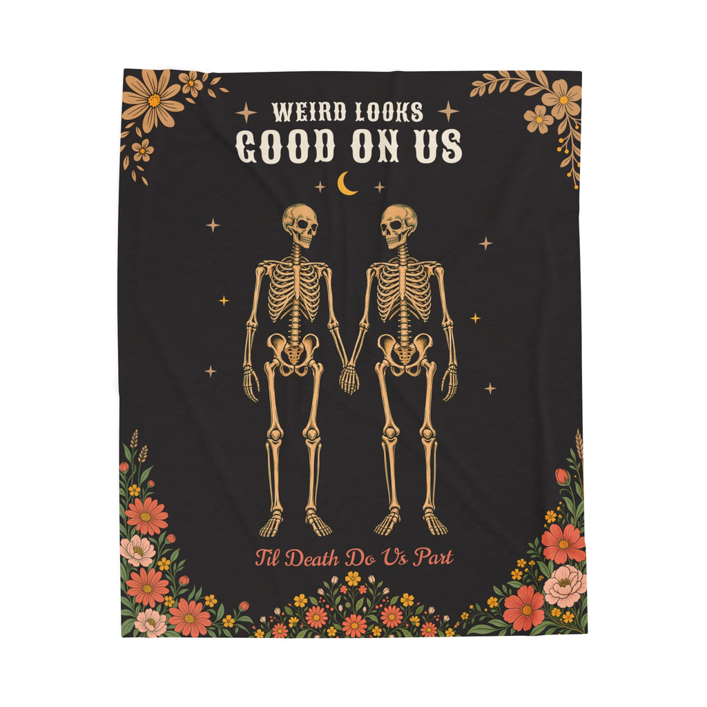 The Black gothic blanket in velveteen plush lies flat on white, with two skeletons below "WEIRD LOOKS / GOOD ON US".