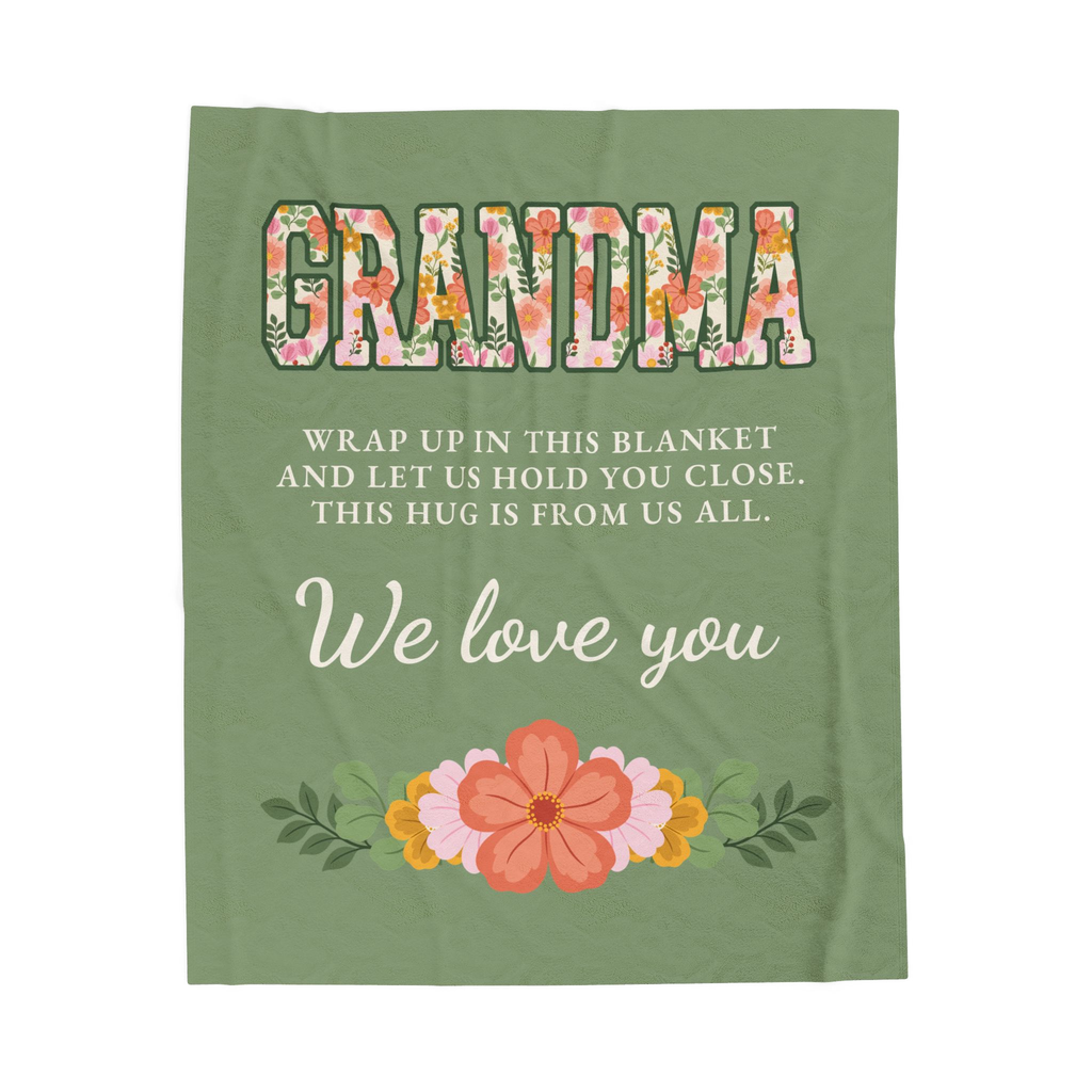 Sage grandma blanket in velveteen plush lies flat on white, with floral "GRANDMA" letters, cream words and a flower garland.