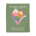 Sage Grandma's Garden blanket in velveteen plush lies flat on white, showing a bouquet tied with a pink bow beneath "FROM ALL OF US".