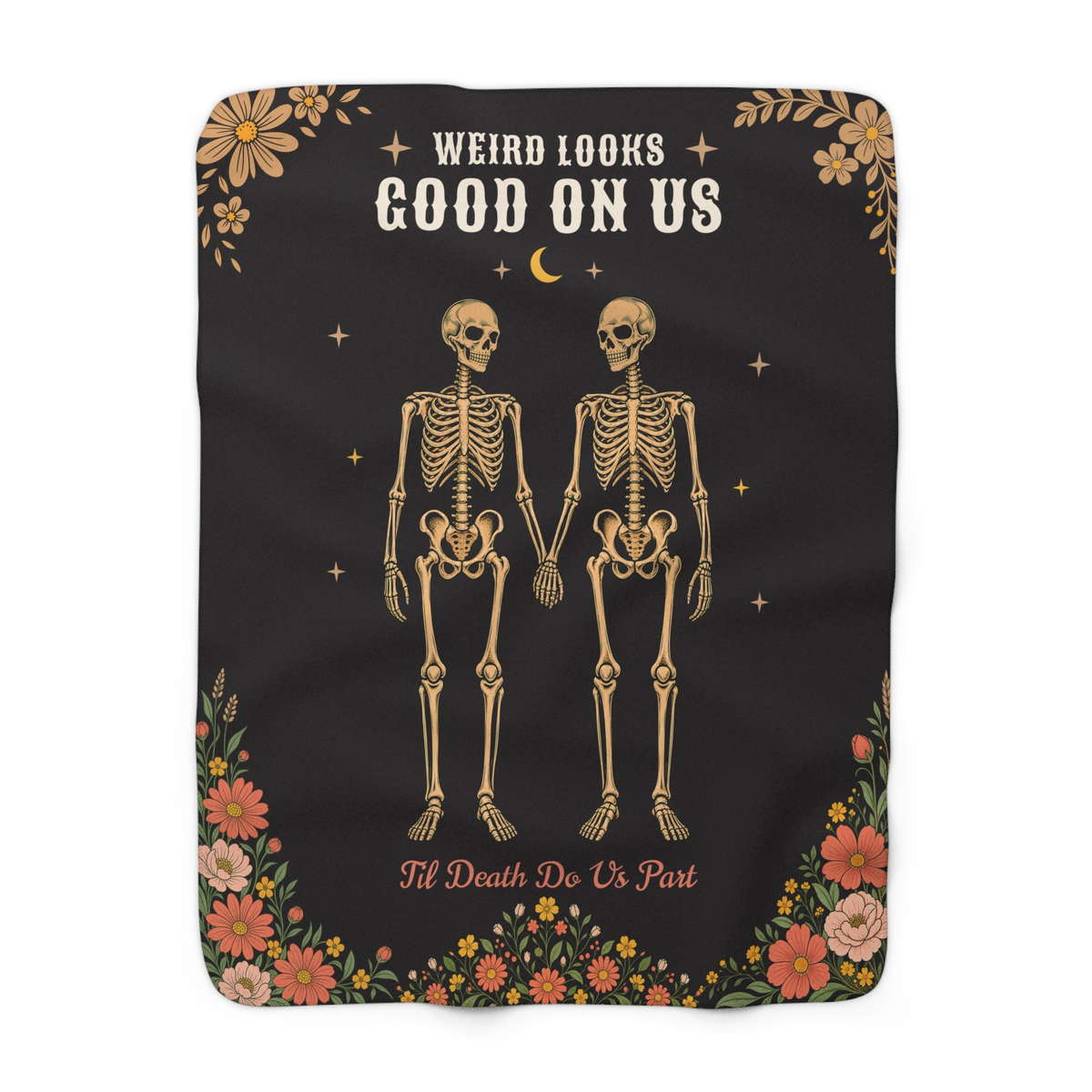 Two tan skeletons hold hands on a Black sherpa fleece blanket laid flat on white, with cream capitals and rounded corners.