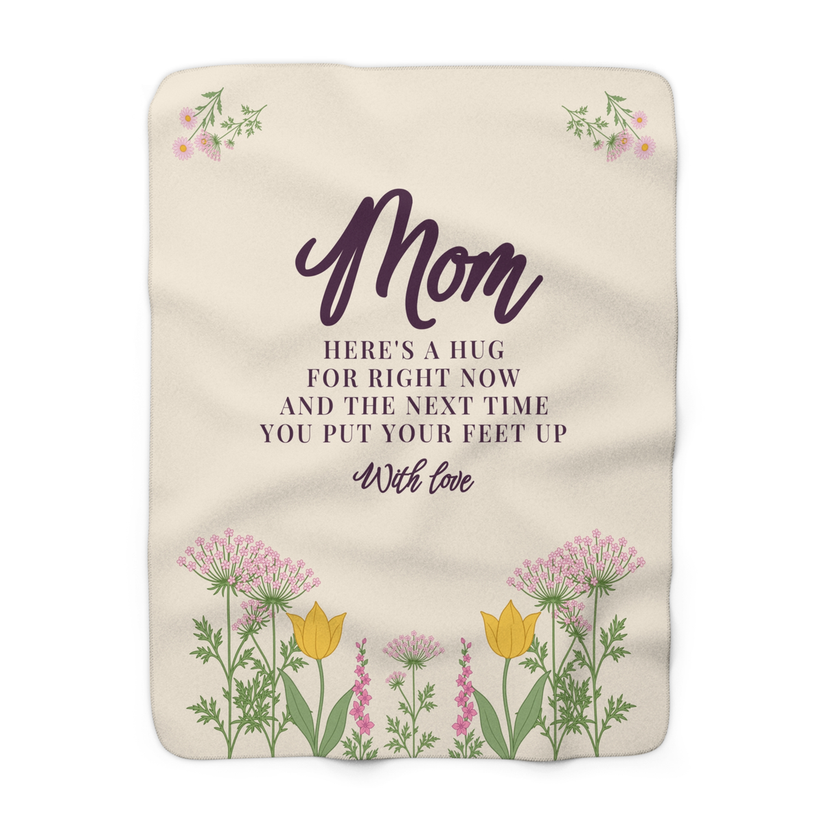 Cream sherpa fleece blanket for Mom laid flat on white, showing deep plum words above colorful wildflowers and sprays in both top corners.