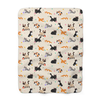 Cream cat sherpa blanket laid flat on white, showing cartoon cats, pastel yarn balls and daisies on the printed fleece front.