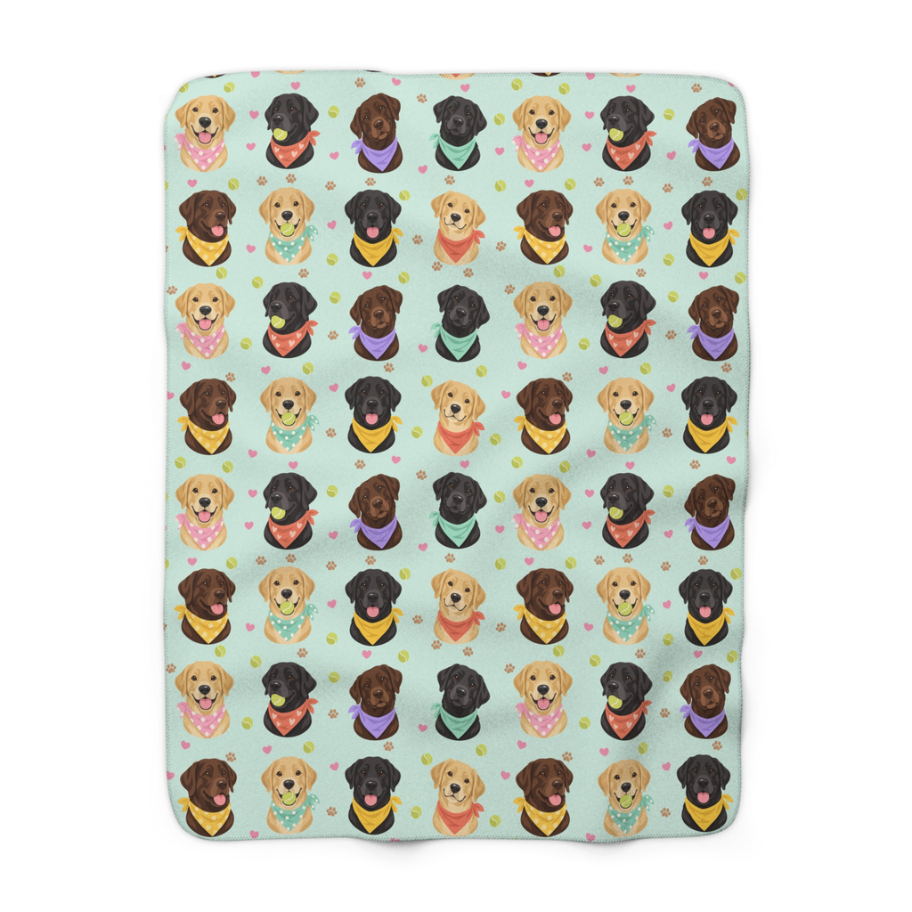 Mint sherpa fleece blanket laid flat on white, with rounded corners and the full repeat of black, yellow and chocolate Labs in pastel bandanas.