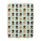 Mint sherpa fleece blanket laid flat on white, with rounded corners and the full repeat of black, yellow and chocolate Labs in pastel bandanas.