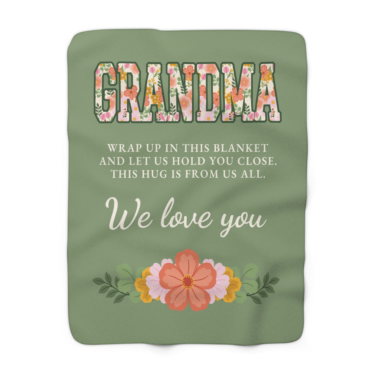Sage grandma hug blanket in sherpa fleece lies flat on white, showing floral "GRANDMA" above the cream family message.