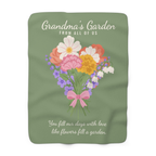 Sage sherpa fleece blanket for grandmother lies flat on white, showing "Grandma's Garden" above a bouquet tied with a pink bow.