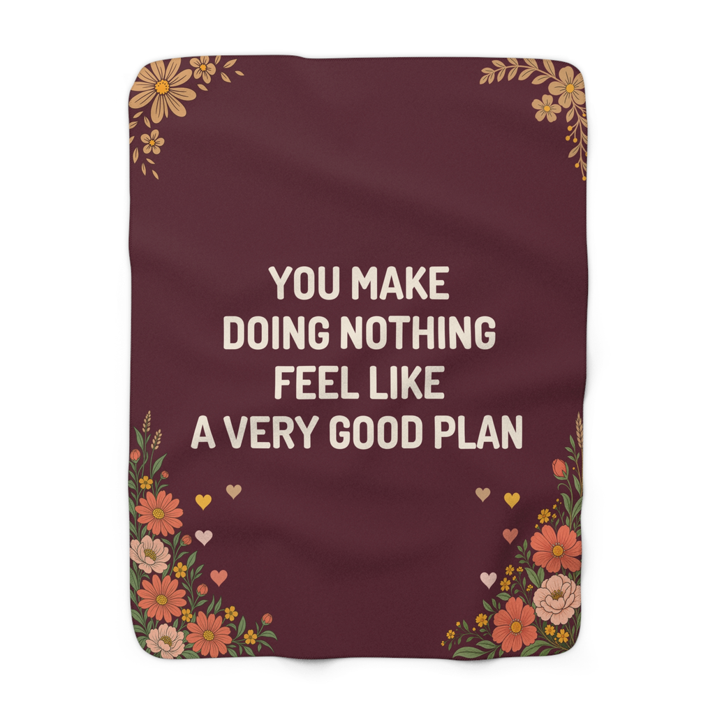 Rounded corners frame a Wine valentines blanket in sherpa fleece laid flat on white, with bold cream words, wildflowers and small hearts.