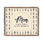 Cream wildflower throw blanket in woven cotton, 60 x 50 inches, lies flat on white with a dark arch, flower rows and fringe on all edges.