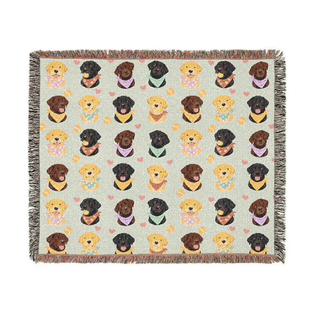 Fringe edges surround the Mint woven cotton blanket on white, displaying all the rows of black, yellow and chocolate Lab portraits.