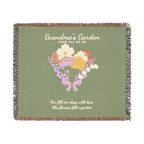 Sage flower throw blanket in woven cotton lies flat on white: "Grandma's Garden", a bouquet of flowers tied with a bow and fringe on all four sides.