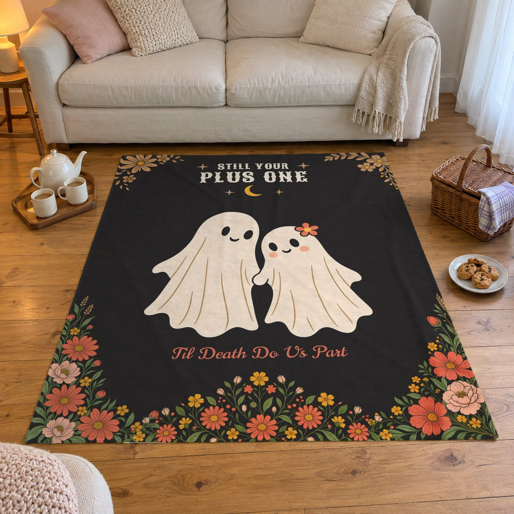An indoor picnic has a 50 x 60 inch Black velveteen plush ghost blanket on an oak floor beside a teapot, two mugs and cookies.