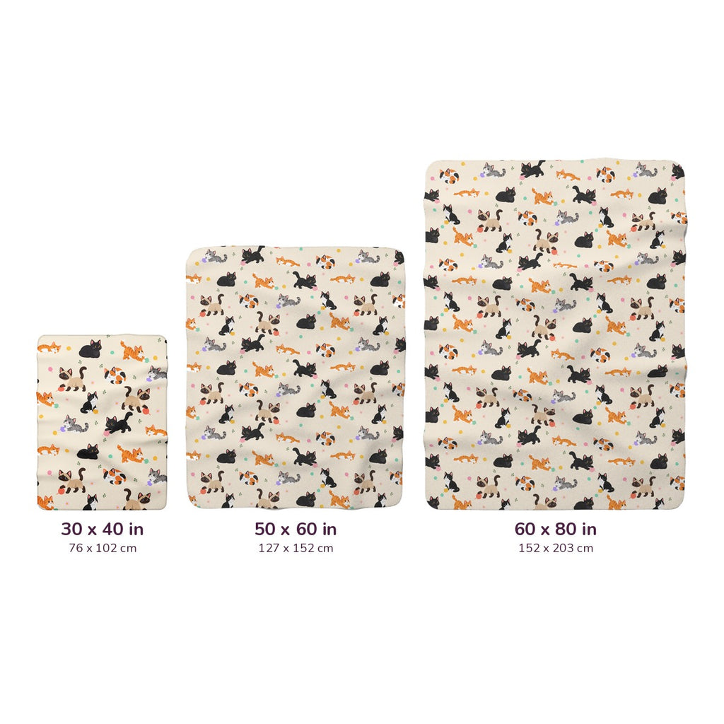 Three Cream sherpa fleece blankets with cats line up on white, labeled 30 x 40, 50 x 60 and 60 x 80 inches, with cm measurements.