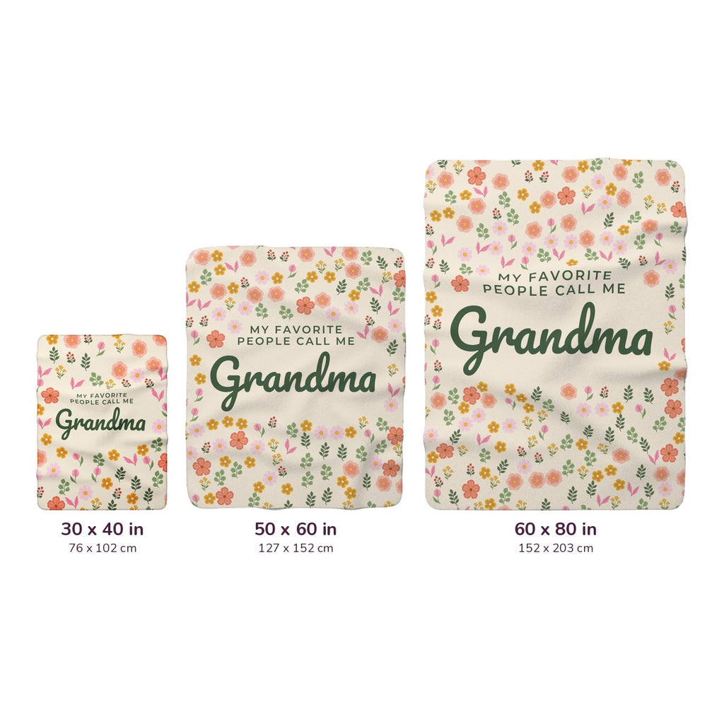 Cream sherpa fleece blankets sit side by side on white, labeled 30 x 40, 50 x 60 and 60 x 80 inches, with measurements in cm too.